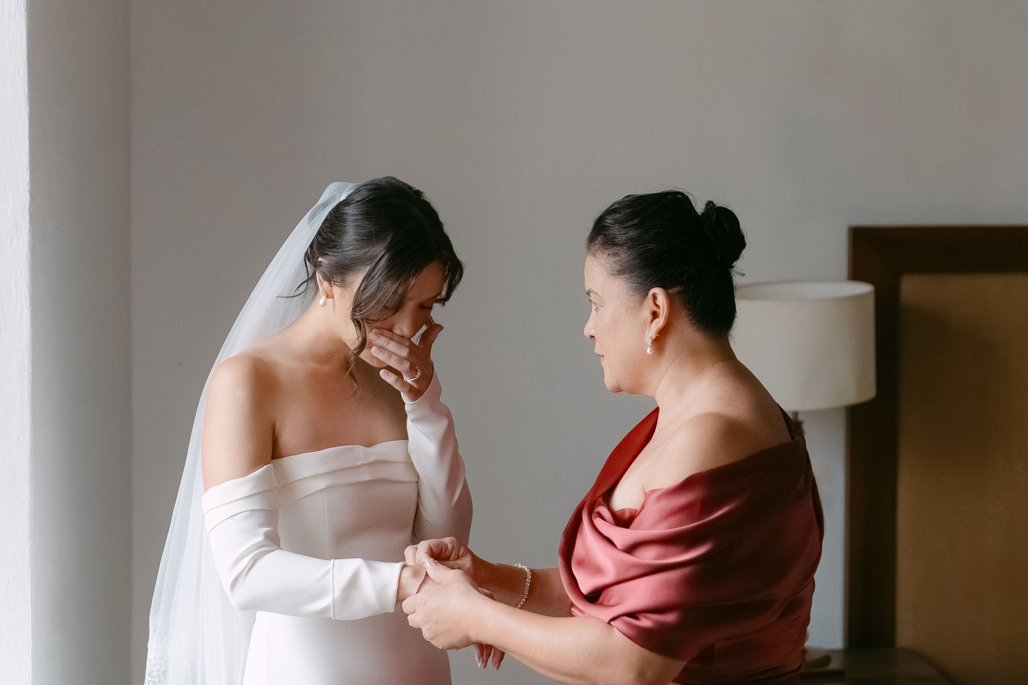 editorial couple portrait posing very serious with the groom looking at the camera and bride looking away