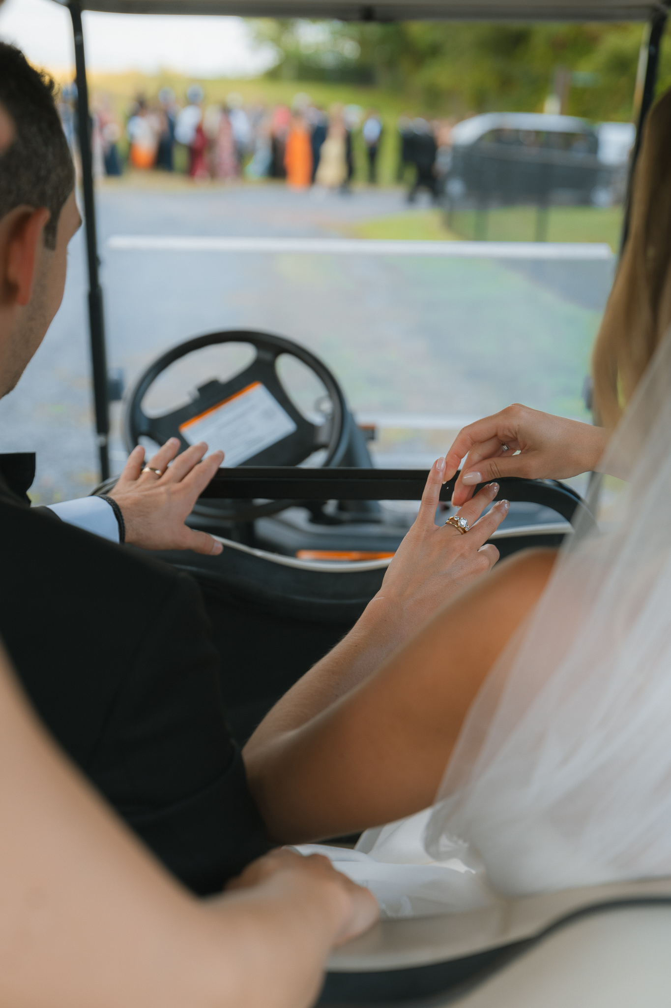 Hutton Brickyards wedding portraits sweet embrace between bride and groom in a golf cart