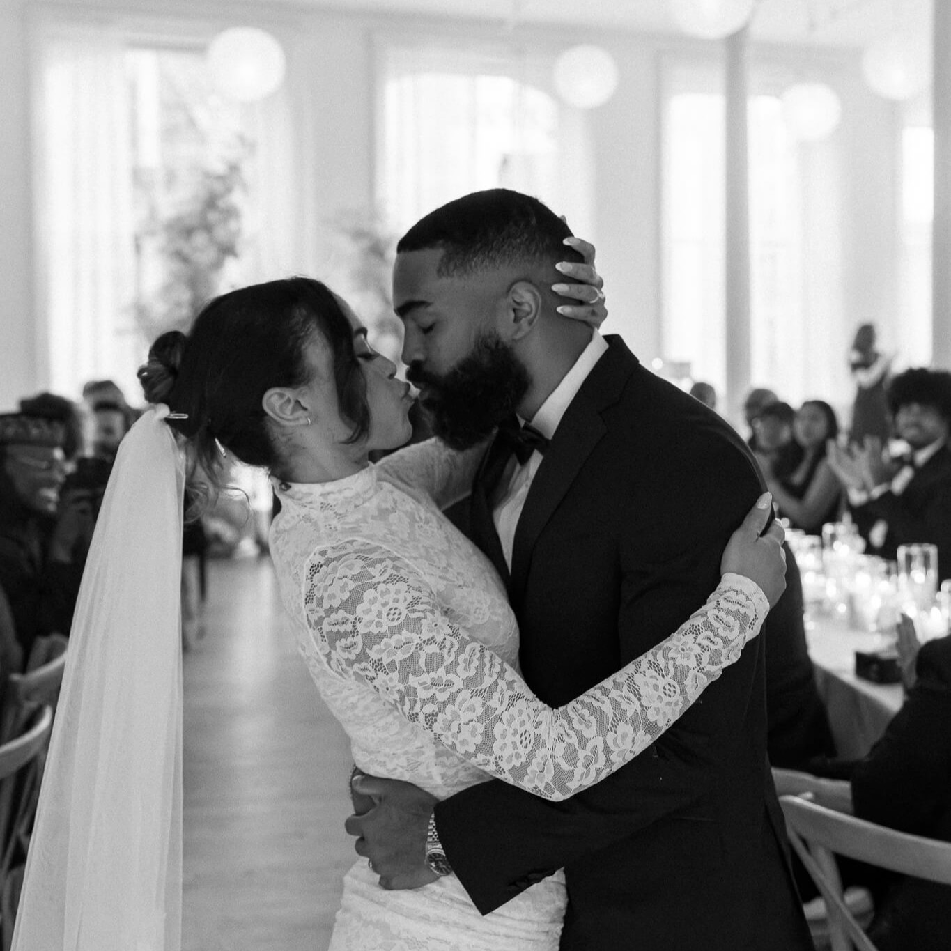 NYC-home studios wedding photography couple kissing in the middle of the aisle after the ceremony
